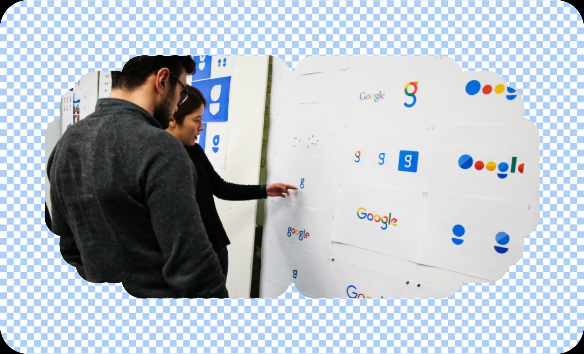 Designers critiquing logo options that eventually led to the 2015 rebrand.